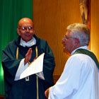 Fr. J. J. Schwall is officially installed as a pastor