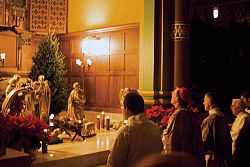 The faithful welcome Christ at Midnight Mass