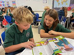 Our Lady of Lourdes students pair up for literacy
