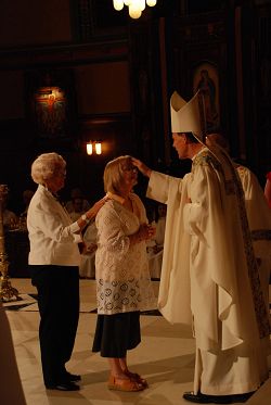 Cathedral's Easter Vigil welcomes 20 into full communion with church