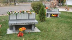 Mothers and fathers memorial benches in Helper's cemetery bring comfort to family members
